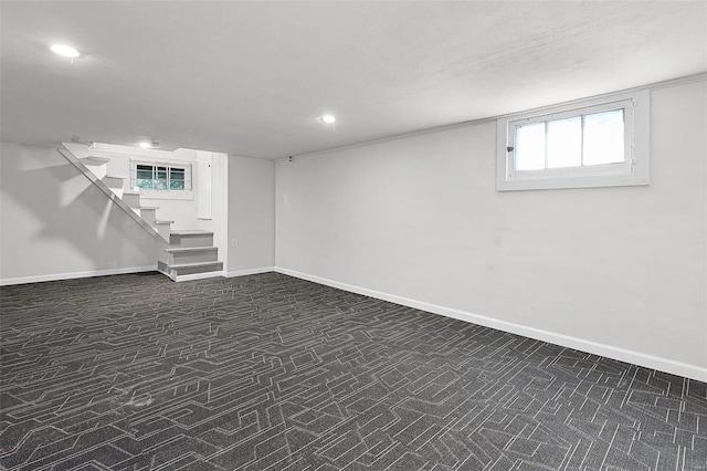 basement with dark carpet