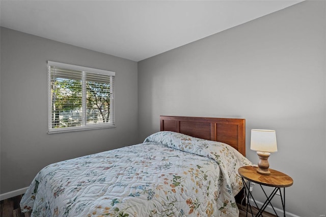 bedroom featuring hardwood / wood-style flooring