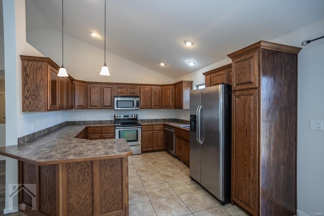 kitchen featuring lofted ceiling, hanging light fixtures, light tile patterned flooring, kitchen peninsula, and stainless steel appliances