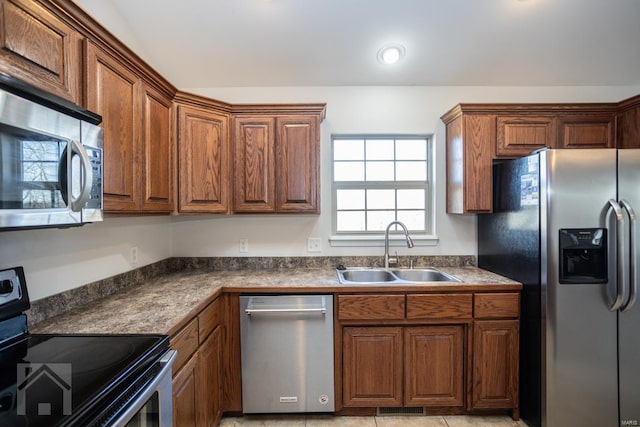 kitchen with sink and stainless steel appliances