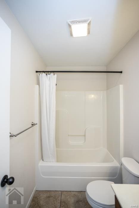 full bathroom featuring tile patterned floors, vanity, shower / tub combo, and toilet