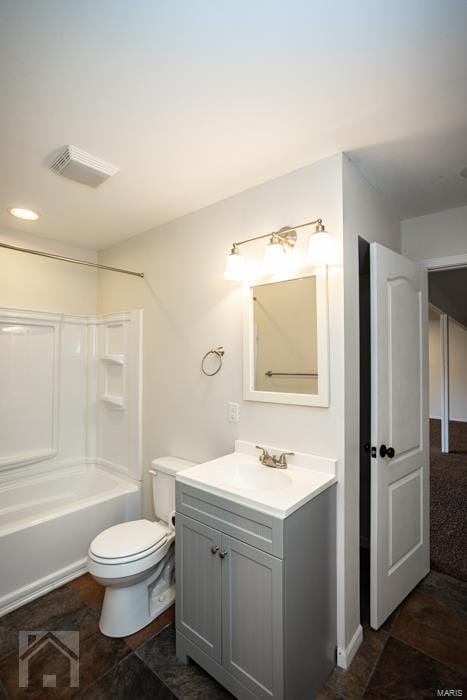 full bathroom featuring tile patterned floors, vanity, toilet, and shower / washtub combination