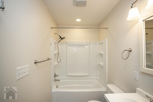 full bathroom with shower / bathing tub combination, vanity, and toilet