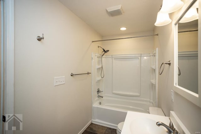 full bathroom with shower / tub combination, sink, tile patterned flooring, and toilet