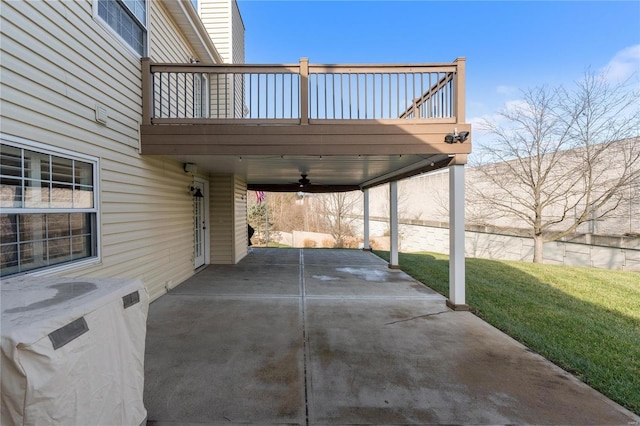 view of patio featuring ceiling fan