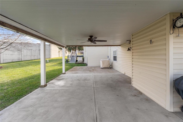 view of patio featuring ceiling fan