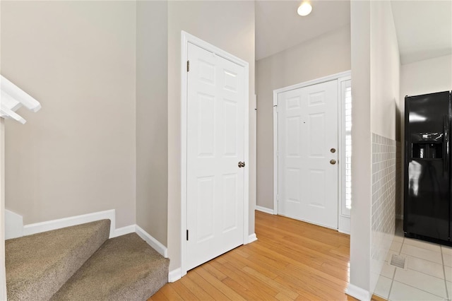 foyer entrance featuring light hardwood / wood-style floors