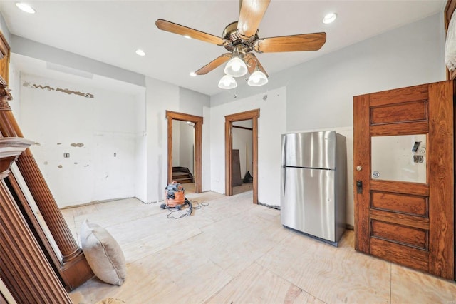 kitchen featuring stainless steel fridge and ceiling fan