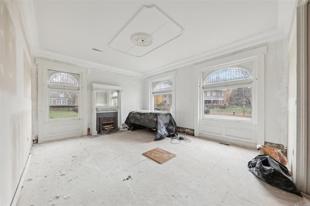 unfurnished sunroom with a fireplace