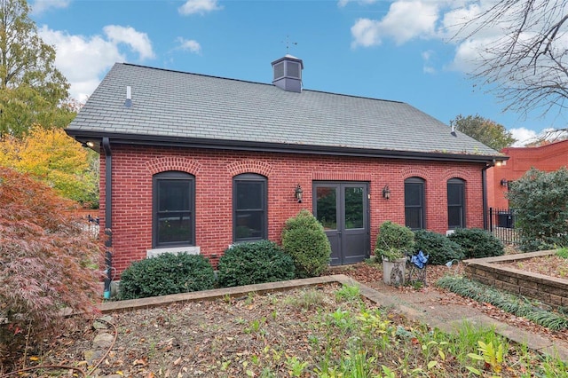 back of house with french doors