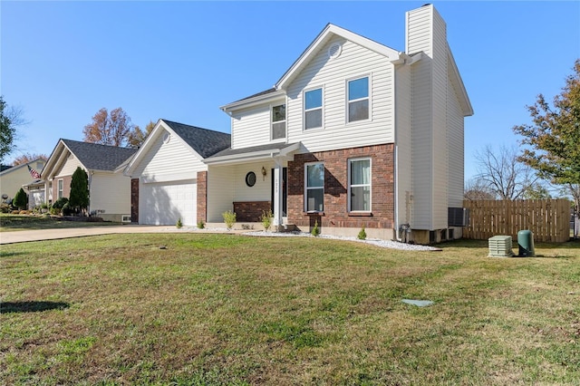 front of property featuring a garage and a front yard