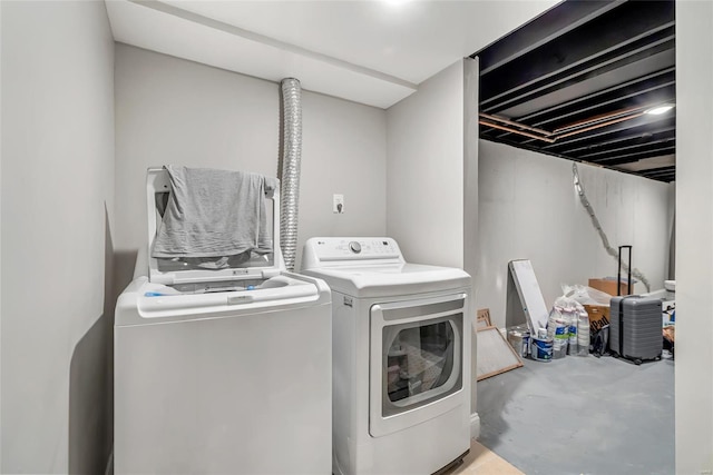 laundry area with washer and clothes dryer