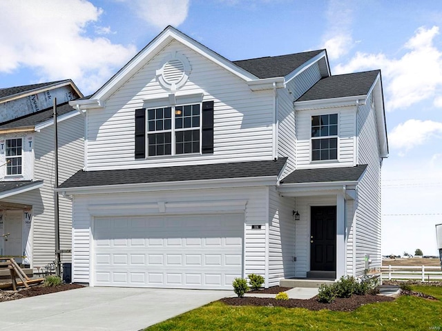 view of front of house with a garage