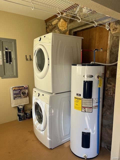 washroom with electric water heater, electric panel, and stacked washer and clothes dryer