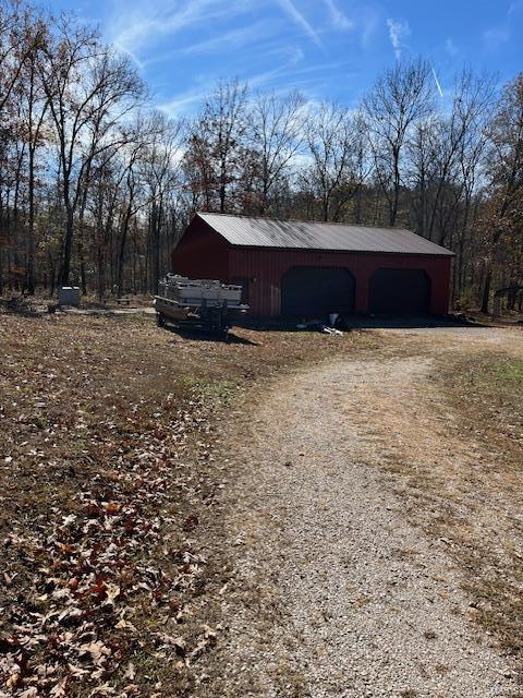 view of outdoor structure with a garage