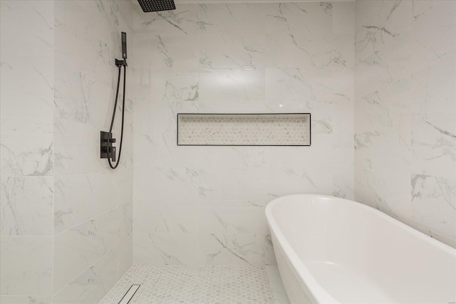 bathroom featuring tile walls and plus walk in shower