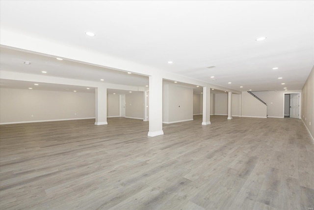 basement featuring light wood-type flooring