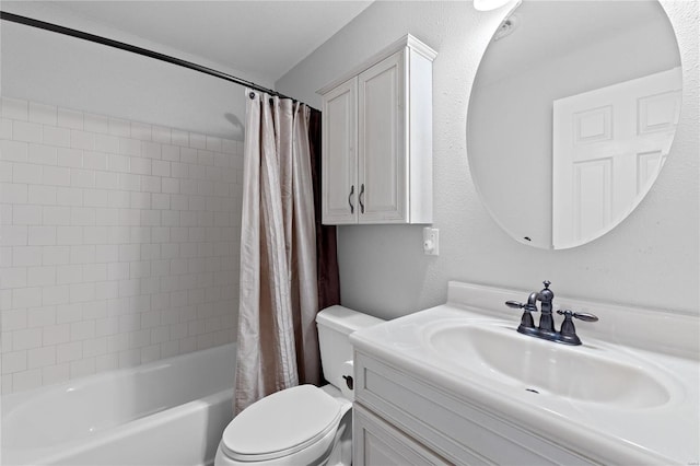 full bathroom featuring vanity, shower / bath combo, and toilet