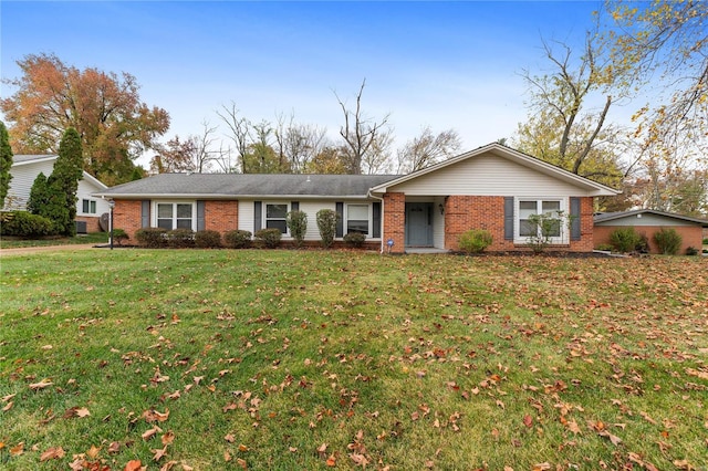 ranch-style home with a front yard