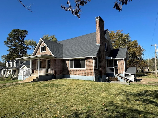 exterior space featuring a porch and a front yard