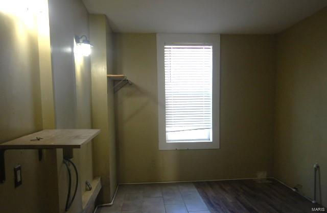 washroom with dark hardwood / wood-style flooring