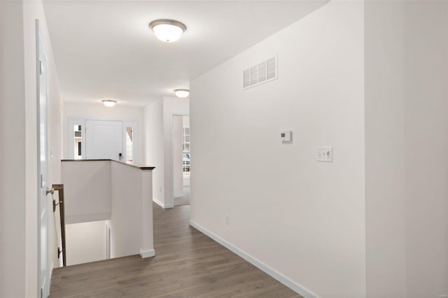 corridor featuring hardwood / wood-style flooring