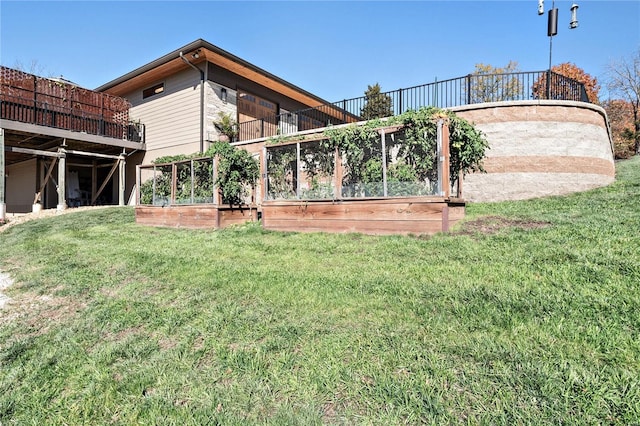 view of yard with a wooden deck