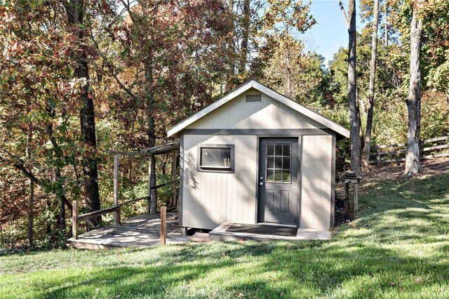 view of outdoor structure featuring a yard