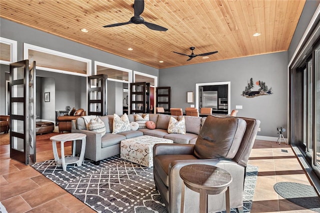 living room featuring ceiling fan, wood ceiling, tile patterned floors, and french doors