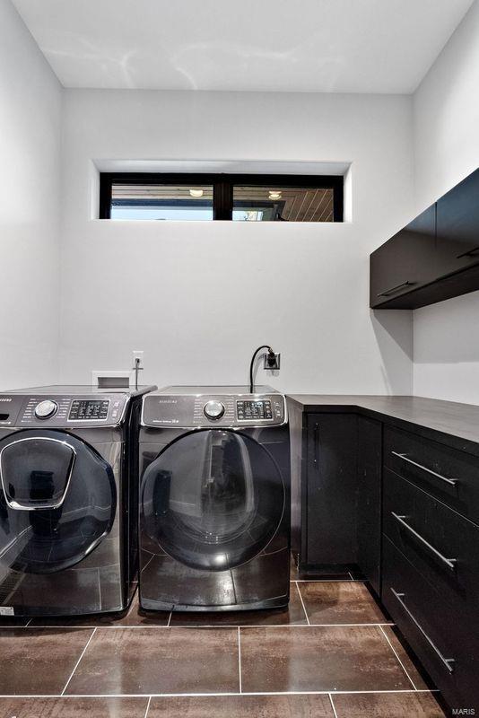 laundry area with washer and clothes dryer