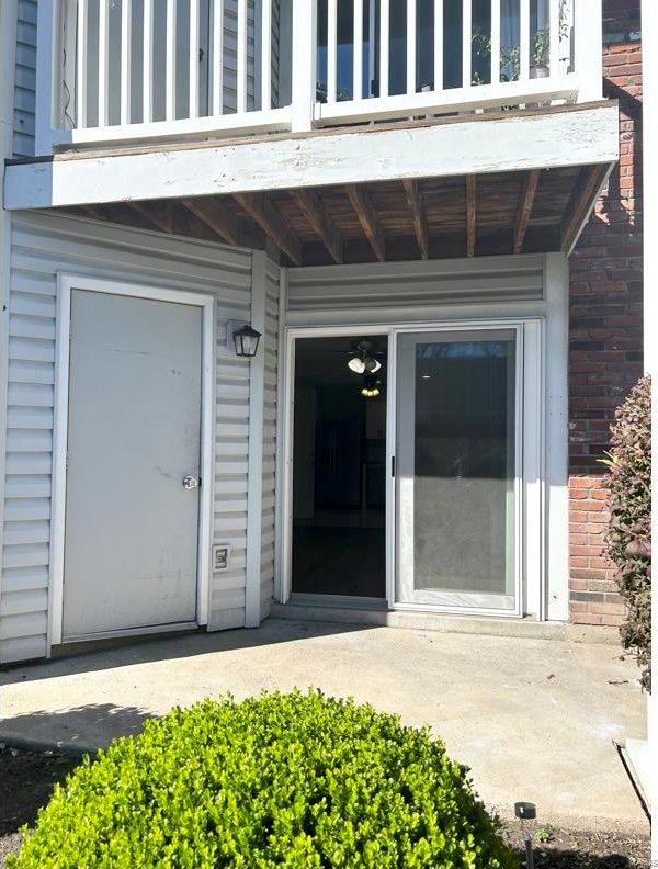 doorway to property with a balcony