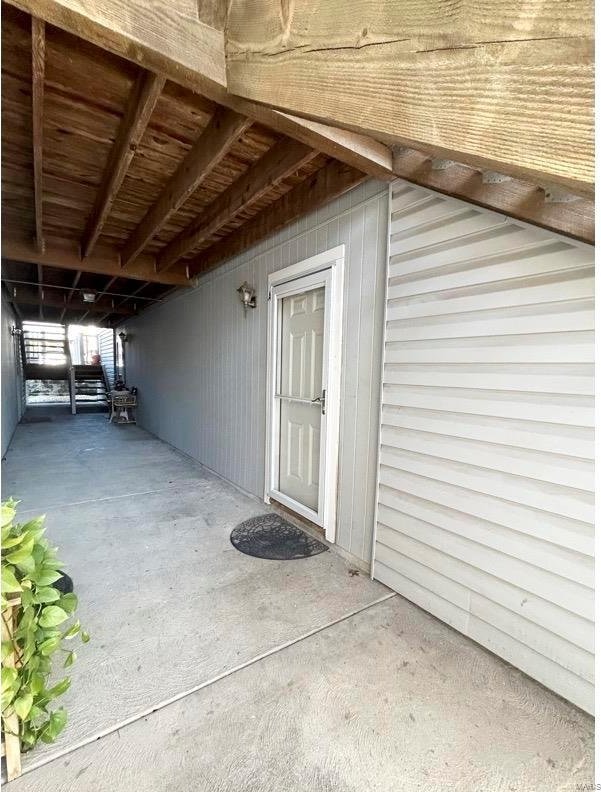 doorway to property with a patio