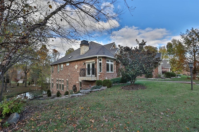 view of home's exterior featuring a yard