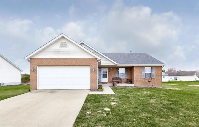 ranch-style house featuring a front yard and a garage