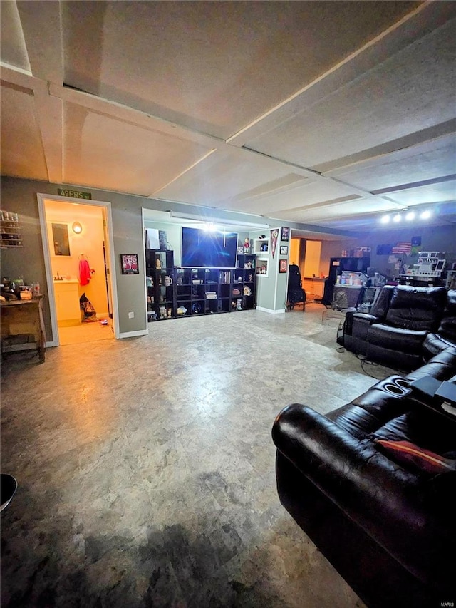 living room featuring concrete floors