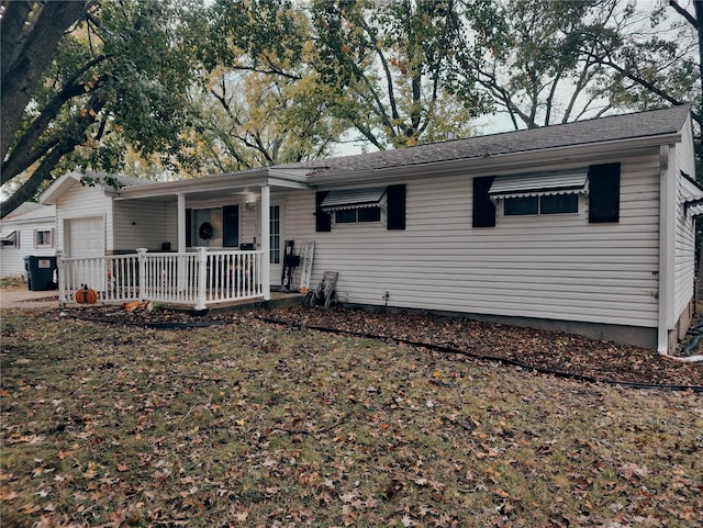 ranch-style home featuring a garage