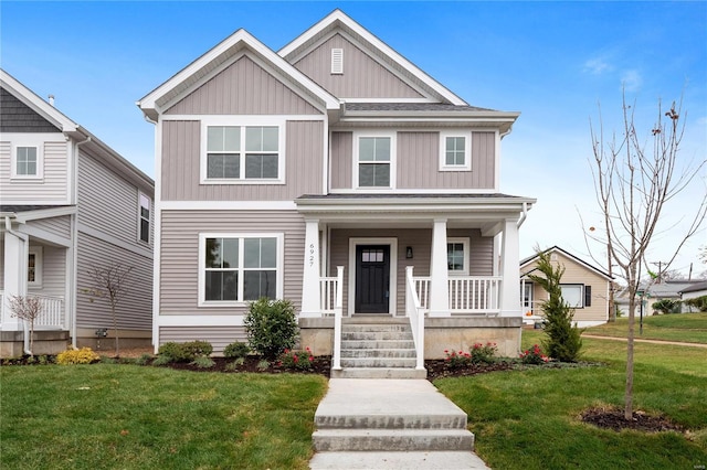 view of front facade with a porch and a front yard