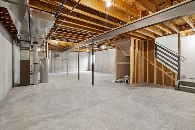 basement featuring gas water heater and heating unit