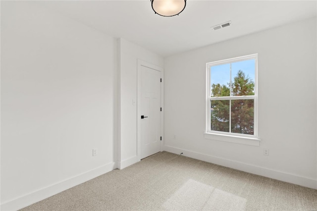 unfurnished room with carpet