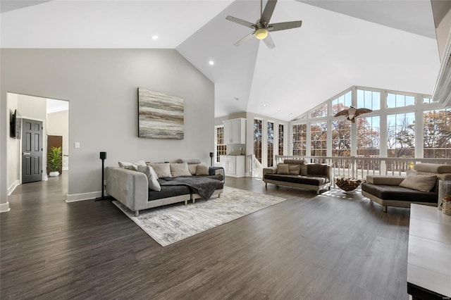 living room with ceiling fan, high vaulted ceiling, and dark hardwood / wood-style floors