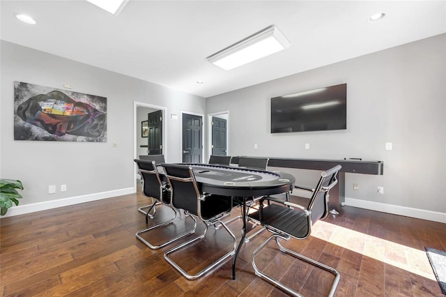 dining space featuring dark hardwood / wood-style flooring