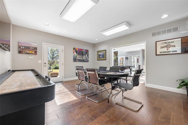 dining area featuring hardwood / wood-style flooring