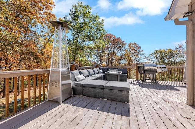 deck featuring area for grilling and an outdoor hangout area