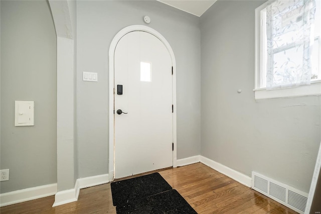 foyer entrance with wood-type flooring