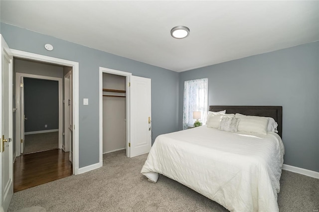 carpeted bedroom with a closet