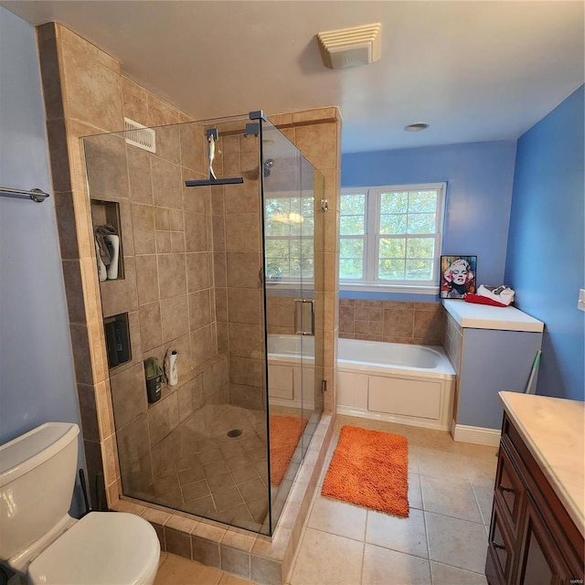 full bathroom with tile patterned flooring, vanity, toilet, and independent shower and bath