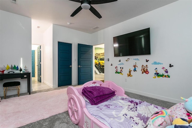 carpeted bedroom with ceiling fan