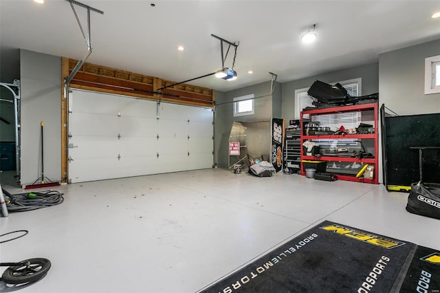 garage featuring a garage door opener