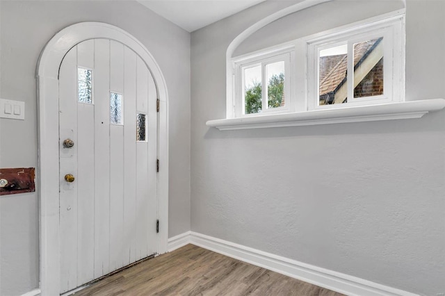 foyer entrance with light wood-type flooring