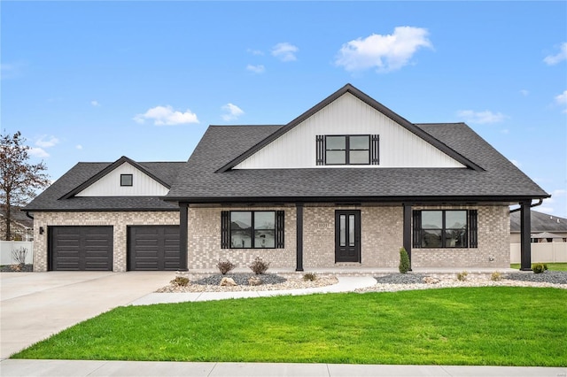 modern inspired farmhouse featuring a garage, a porch, and a front yard